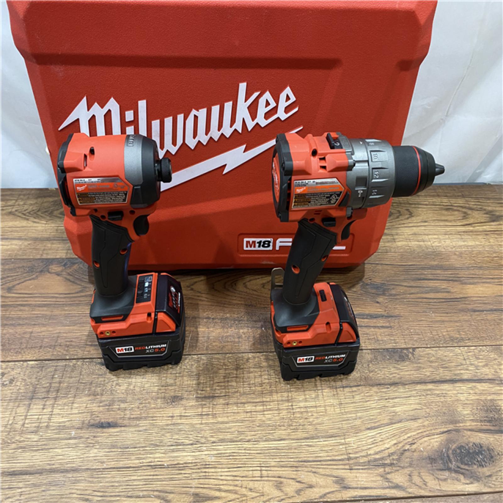 AS IS Milwaukee M18 FUEL 18V Lithium-Ion Brushless Cordless Hammer Drill and Impact Driver Combo Kit (2-Tool) with 2 Batteries