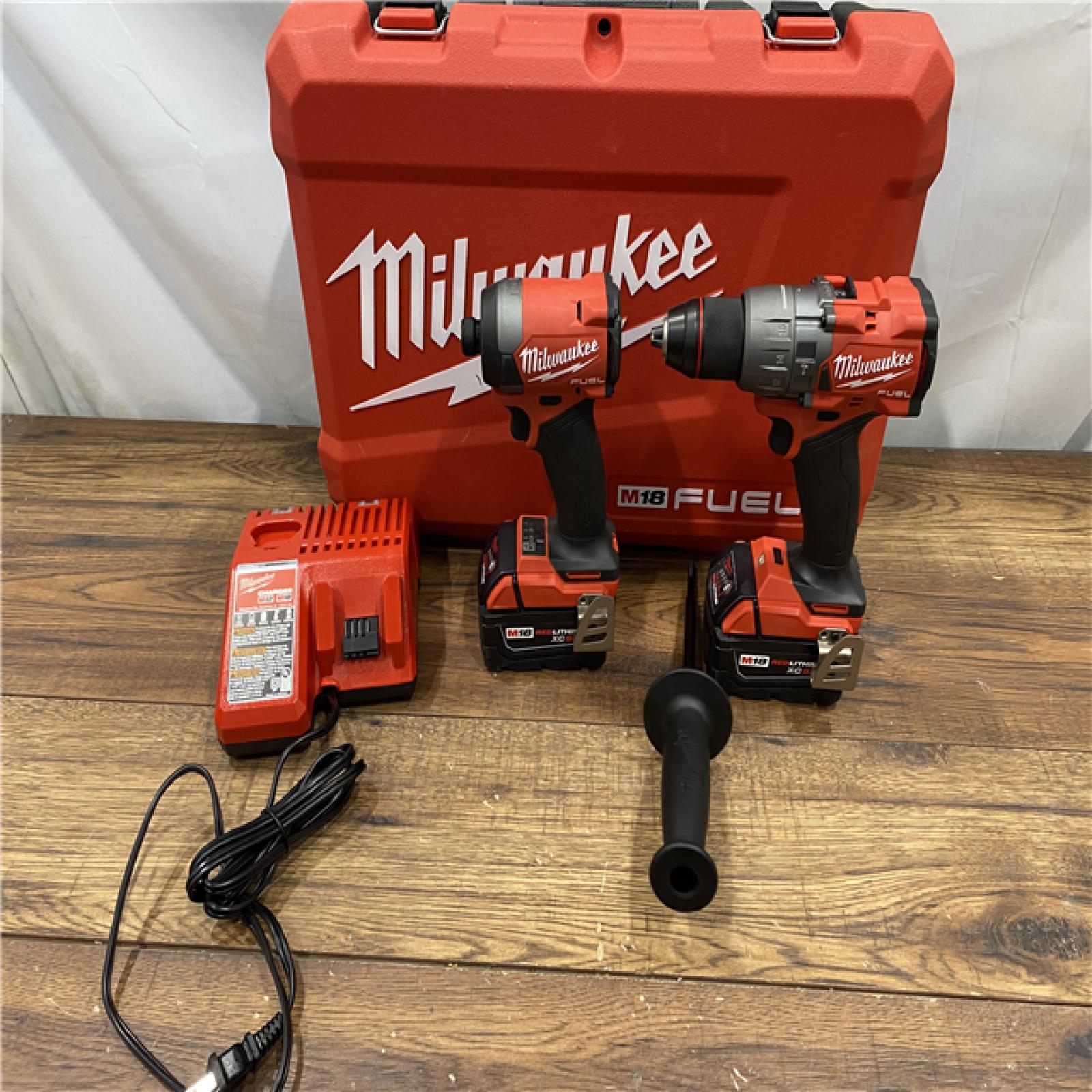 AS IS Milwaukee M18 FUEL 18V Lithium-Ion Brushless Cordless Hammer Drill and Impact Driver Combo Kit (2-Tool) with 2 Batteries