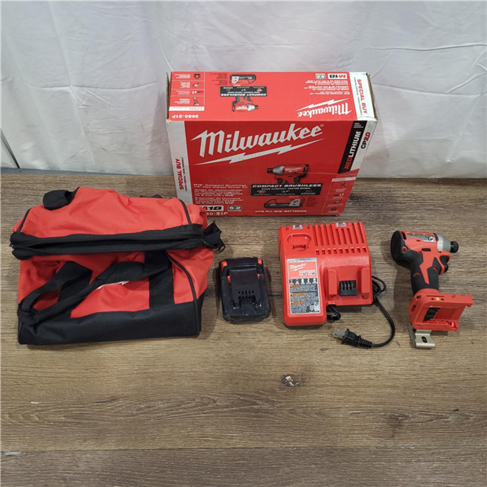 AS-IS Milwaukee M18 Compact Brushless 1/4  Hex Impact Driver Kit