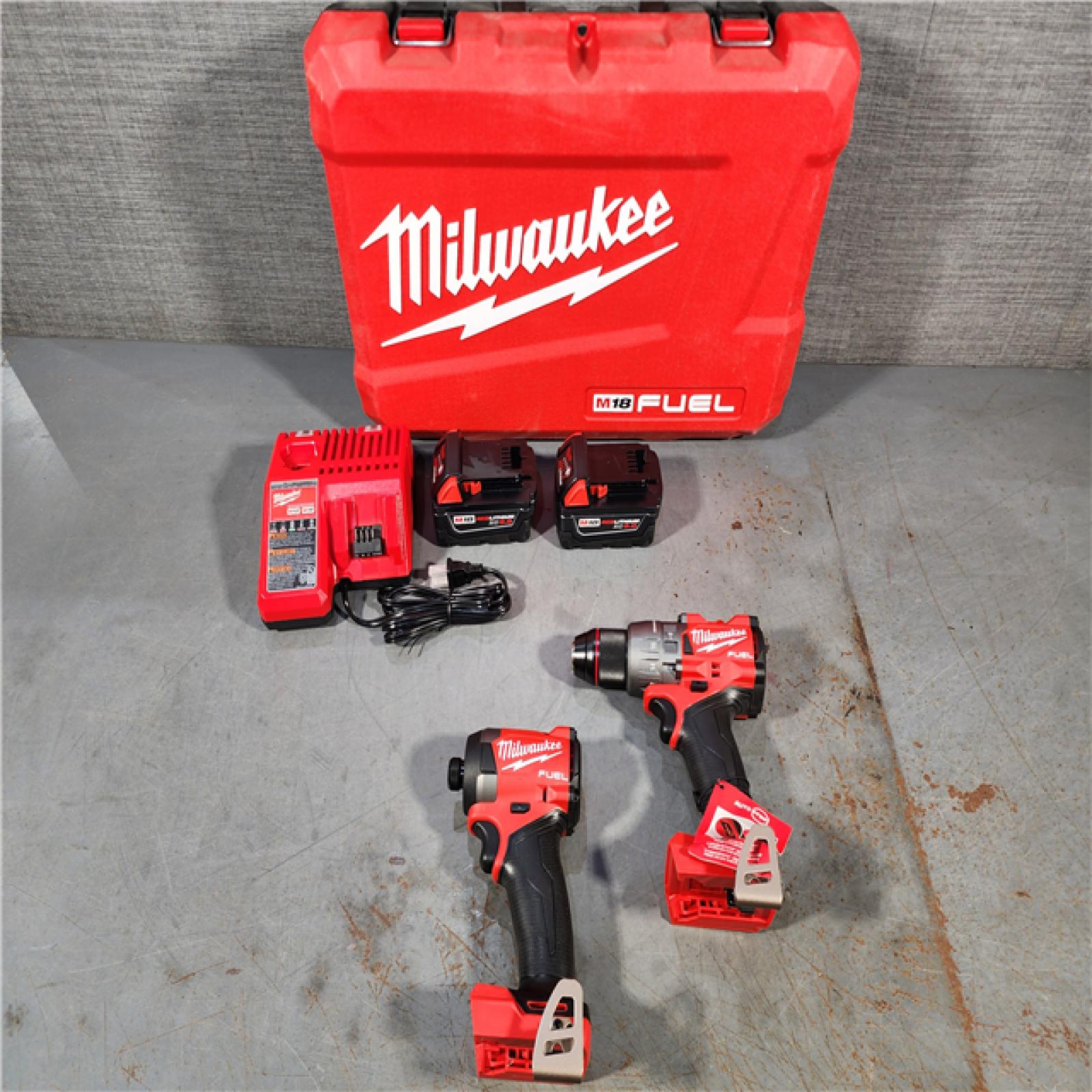 HOUSTON LOCATION - AS-IS (APPEARS LIKE NEW) Milwaukee M18 FUEL 18V Lithium-Ion Brushless Cordless Hammer Drill and Impact Driver Combo Kit (2-Tool) with 2 Batteries